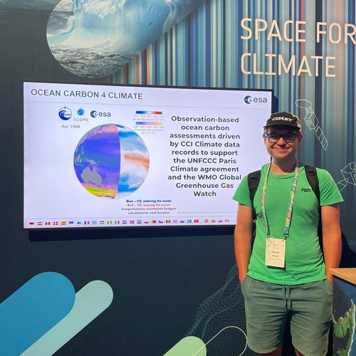 Dr Dan Ford standing next to his CO₂ flux animation